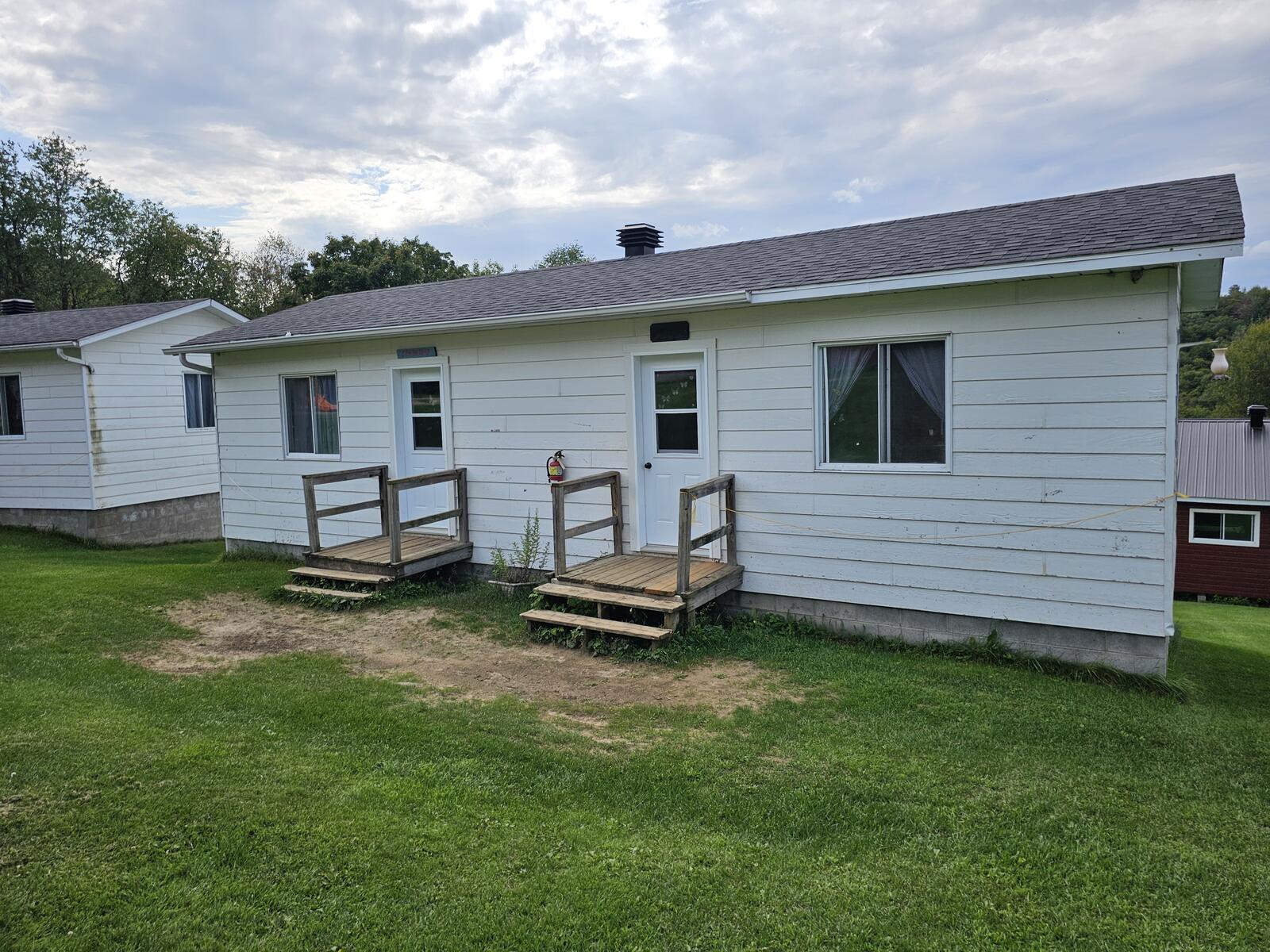 Rustic cabin rental at Camp Amy Molson near Montreal